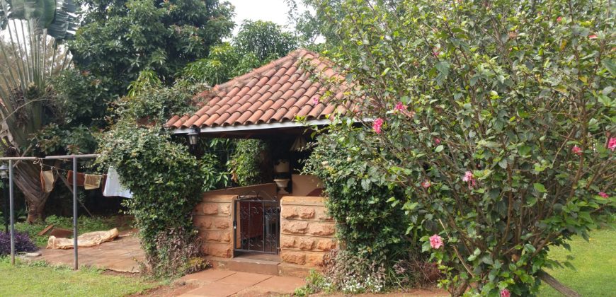 Prime 1 Acre Parcel of Land with an Extremely Clean 8 Bedrooms House in Runda for Sale.