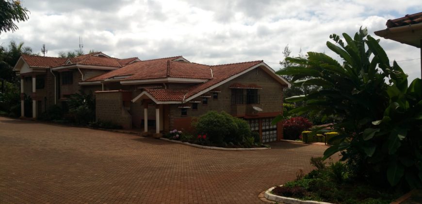 Prime 1 Acre Parcel of Land with an Extremely Clean 8 Bedrooms House in Runda for Sale.