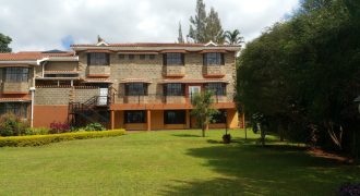 Prime 1 Acre Parcel of Land with an Extremely Clean 8 Bedrooms House in Runda for Sale.
