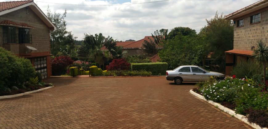 Prime 1 Acre Parcel of Land with an Extremely Clean 8 Bedrooms House in Runda for Sale.
